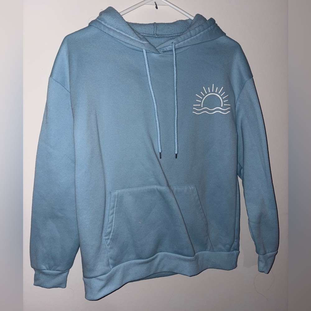 Light Blue Pullover Hoodie with Sun Graphic
